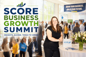 The SCORE Business Growth Summit logo overlays a smiling woman at a vibrant networking event.