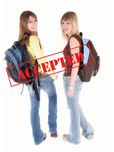 Two Students With BackPacks Accepted