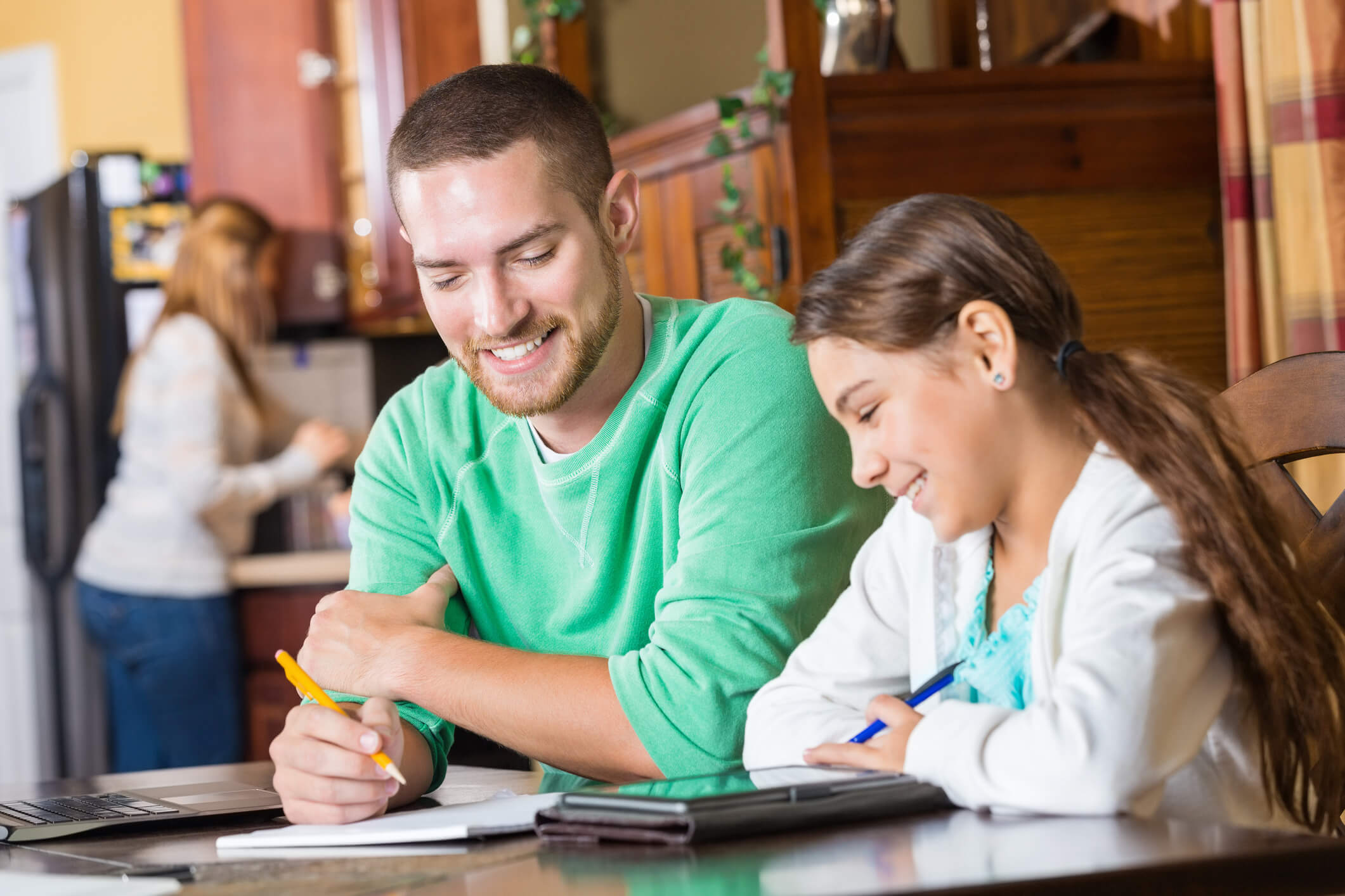 A Math tutor in Calgary helps a student with their homework