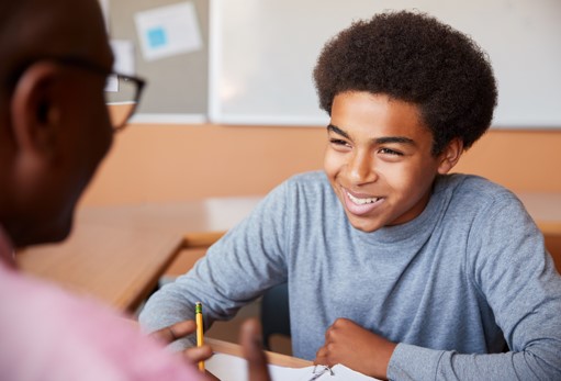 happy young man being tutored