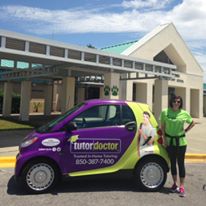 Employee Posing with Tutor Doctor Car