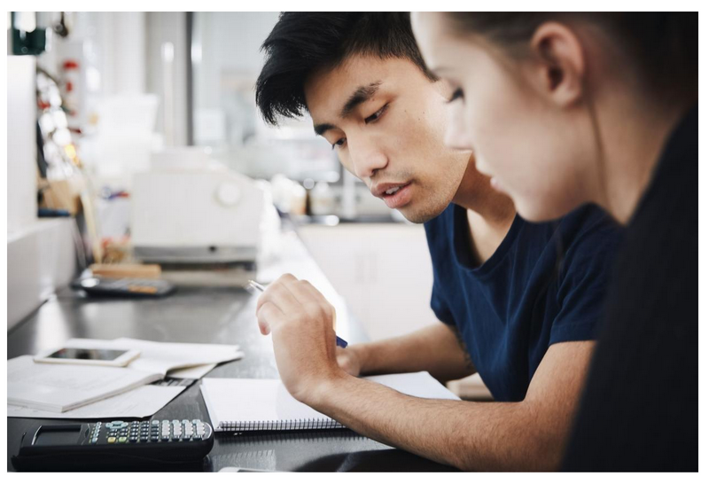 student working with a tutor