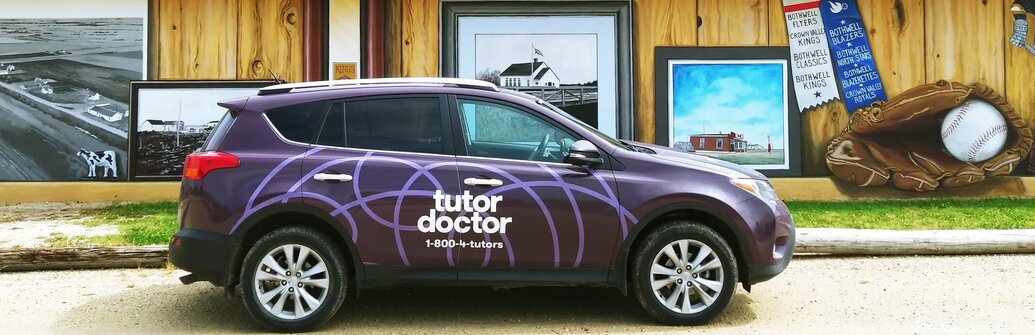 Tutor Doctor branded car infront of wall art