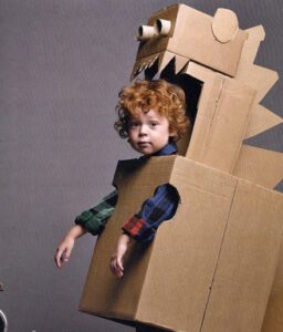 Kid in Dinosaur Box Costume