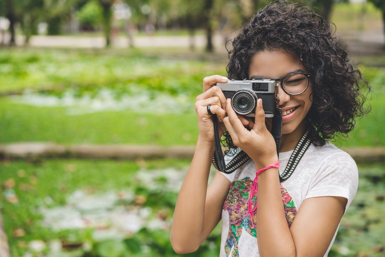 girl taking a photo