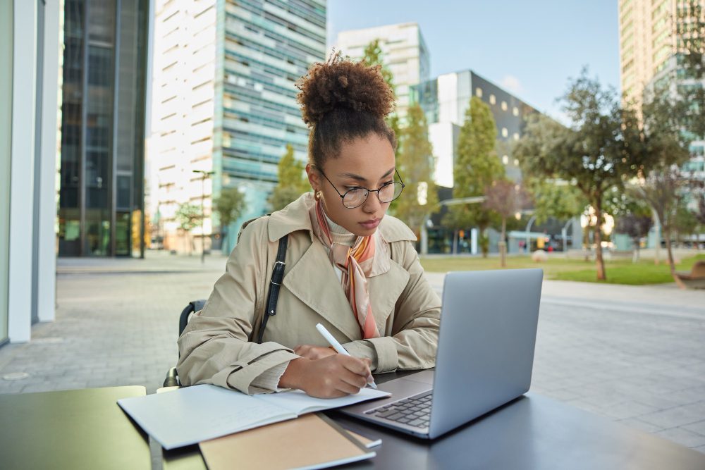 Student sits at computer to prepare for the SAT