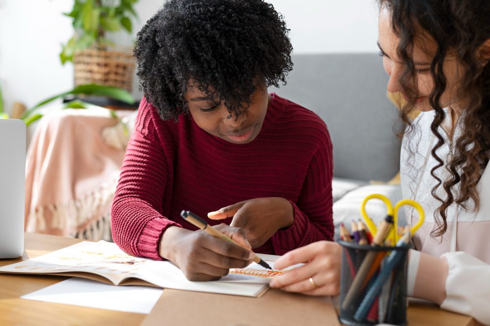 Student reads book at desk